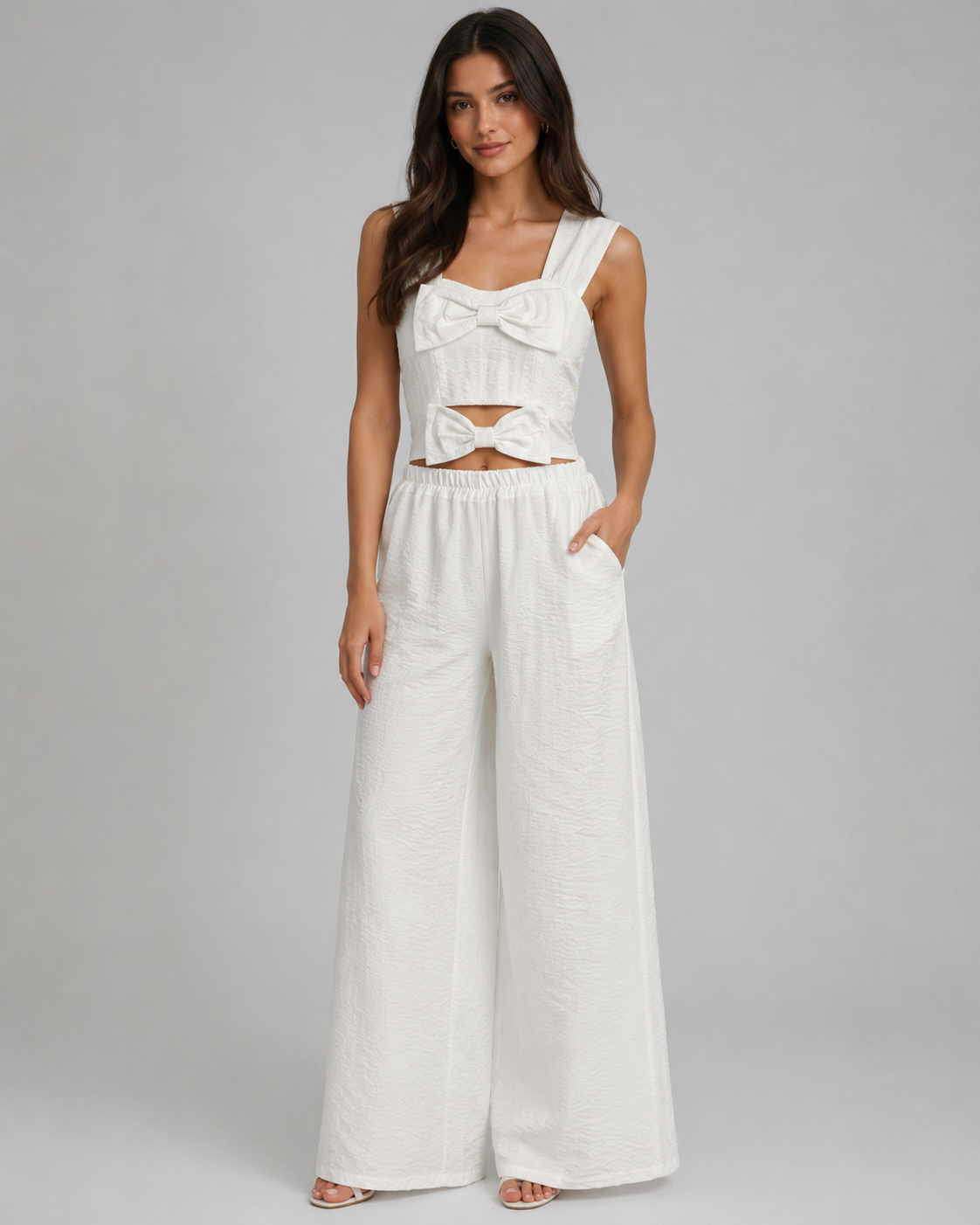 Coordinato top e pantaloni palazzo bianchi con fiocchi