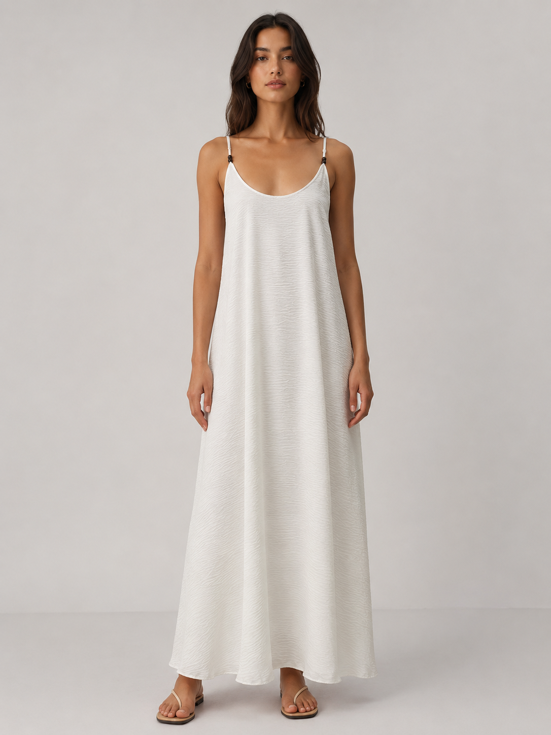 Vestito lungo con spalline e perline