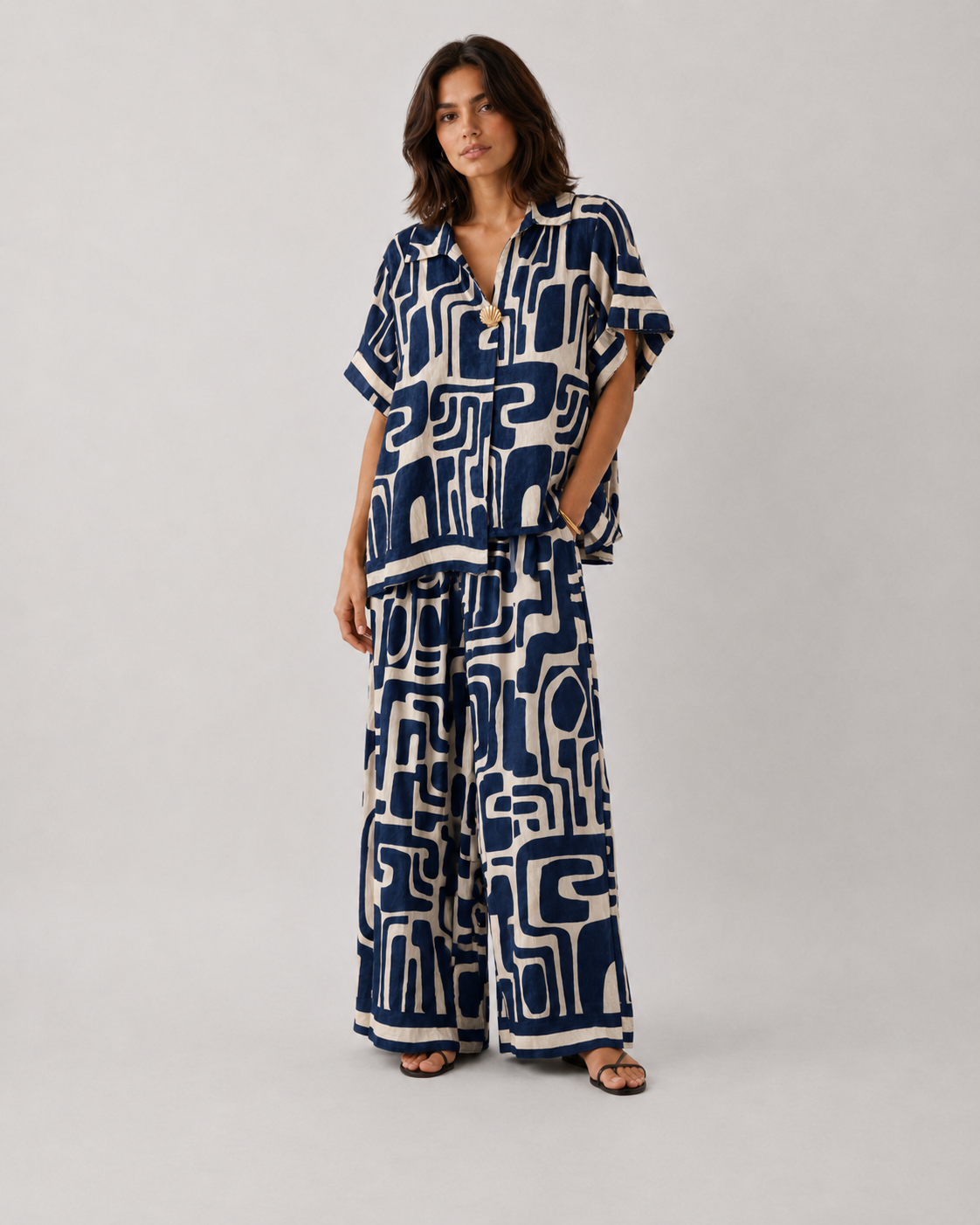 Coordinato camicia e pantaloni palazzo stampa astratta